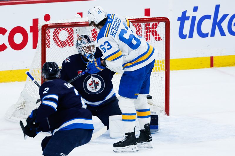 Jan 20, 2026; Winnipeg, Manitoba, CAN; St. Louis Blues forward Jake Neighbours (63) screens Winnipeg Jets goalie Eric Comrie (1) on a goal by forward Jordan Kyrou (25) (not shown) during the second period at Canada Life Centre. Mandatory Credit: Terrence Lee-Imagn Images Jan 20, 2026; Winnipeg, Manitoba, CAN; St. Louis Blues forward Jake Neighbours (63) screens Winnipeg Jets goalie Eric Comrie (1) on a goal by forward Jordan Kyrou (25) (not shown) during the second period at Canada Life Centre. Mandatory Credit: Terrence Lee-Imagn Images
