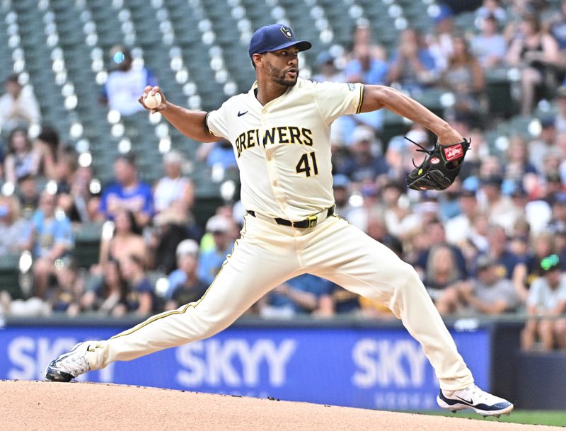 Jul 30, 2024; Milwaukee, Wisconsin, USA; Milwaukee Brewers starting pitcher Joe Ross (41) delivers a pitch against the Atlanta Braves in the first inning at American Family Field. Mandatory Credit: Michael McLoone-USA TODAY Sports