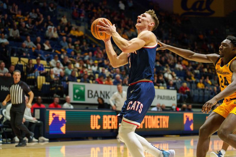 Feb 9, 2023; Berkeley, California, USA; Arizona Wildcats guard Pelle Larsson (3) on a fast break drives to the basket against California Golden Bears forward Sam Alajiki (24) during the second half at Haas Pavilion. Mandatory Credit: Neville E.  Guard-USA TODAY Sports