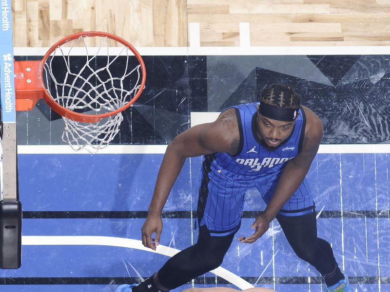 ORLANDO, FL - APRIL 1: Franz Wagner #22 of the Orlando Magic grabs a rebound during the game against the Portland Trail Blazers on April 1, 2024 at Kia Center in Orlando, Florida. NOTE TO USER: User expressly acknowledges and agrees that, by downloading and or using this photograph, User is consenting to the terms and conditions of the Getty Images License Agreement. Mandatory Copyright Notice: Copyright 2024 NBAE (Photo by Fernando Medina/NBAE via Getty Images)