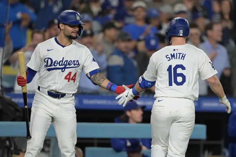 May 20, 2024; Los Angeles, California, USA;  Los Angeles Dodgers catcher Will Smith (16) is congratulated by right fielder Andy Pages (44) after hitting a solo home run in the third inning against the Arizona Diamondbacks at Dodger Stadium. Mandatory Credit: Jayne Kamin-Oncea-USA TODAY Sports