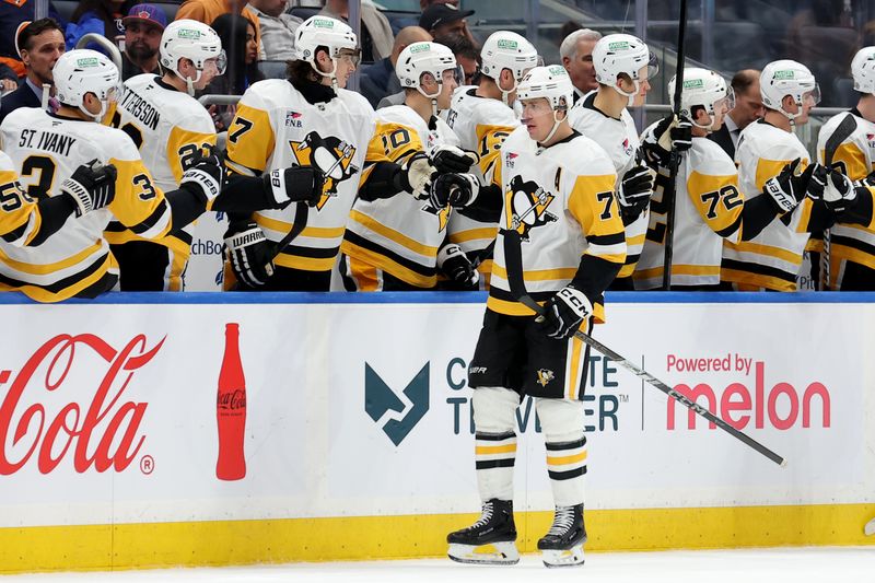 Nov 5, 2024; Elmont, New York, USA; Pittsburgh Penguins center Evgeni Malkin (71) celebrates his goal against the New York Islanders with teammates during the second period at UBS Arena. Mandatory Credit: Brad Penner-Imagn Images