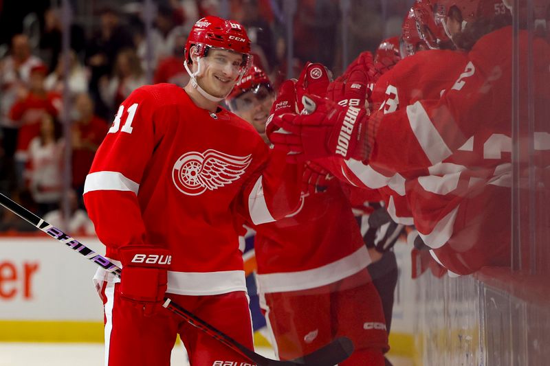 Nov 5, 2022; Detroit, Michigan, USA;  Detroit Red Wings left wing Dominik Kubalik (81) celebrates after scoring in the third period against the New York Islanders at Little Caesars Arena. Mandatory Credit: Rick Osentoski-USA TODAY Sports