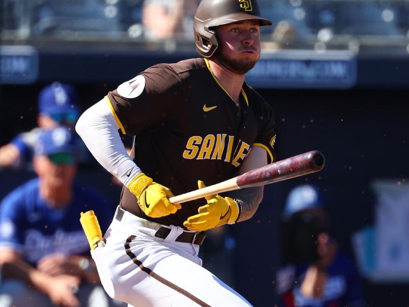 Feb 22, 2024; Peoria, Arizona, USA; San Diego Padres outfielder Jackson Merrill against the Los Angeles Dodgers during a spring training game at Peoria Sports Complex. Mandatory Credit: Mark J. Rebilas-USA TODAY Sports