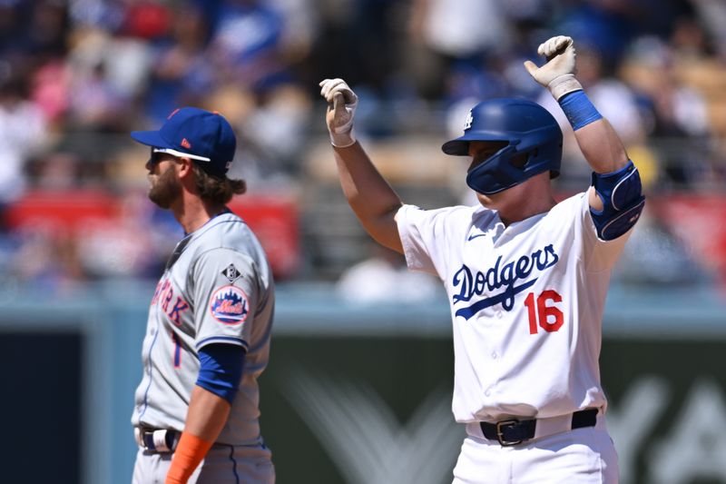 Apr 21, 2024; Los Angeles, California, USA; Los Angeles Dodgers catcher Will Smith (16) celebrates at second base against the New York Mets during the fifth inning at Dodger Stadium. Mandatory Credit: Jonathan Hui-USA TODAY Sports