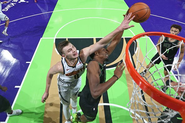 NEW ORLEANS, LA - NOVEMBER 17: Christian Braun #0 of the Denver Nuggets block during the game against the New Orleans Pelicans during the In-Season Tournament on November 17, 2023 at the Smoothie King Center in New Orleans, Louisiana. NOTE TO USER: User expressly acknowledges and agrees that, by downloading and or using this Photograph, user is consenting to the terms and conditions of the Getty Images License Agreement. Mandatory Copyright Notice: Copyright 2023 NBAE (Photo by Layne Murdoch Jr./NBAE via Getty Images)