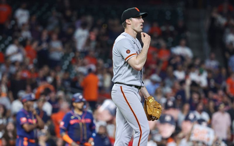 May 1, 2023; Houston, Texas, USA; San Francisco Giants starting pitcher Ross Stripling (48) reacts after a play during the fifth inning against the Houston Astros at Minute Maid Park. Mandatory Credit: Troy Taormina-USA TODAY Sports
