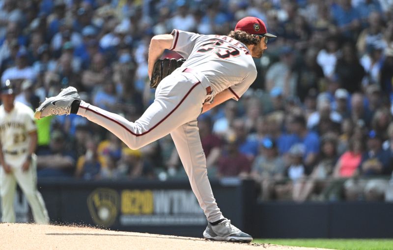 Jun 21, 2023; Milwaukee, Wisconsin, USA; Arizona Diamondbacks starting pitcher Zac Gallen (23) delivers a pitch against the Milwaukee Brewers in the first inning at American Family Field. Mandatory Credit: Michael McLoone-USA TODAY Sports