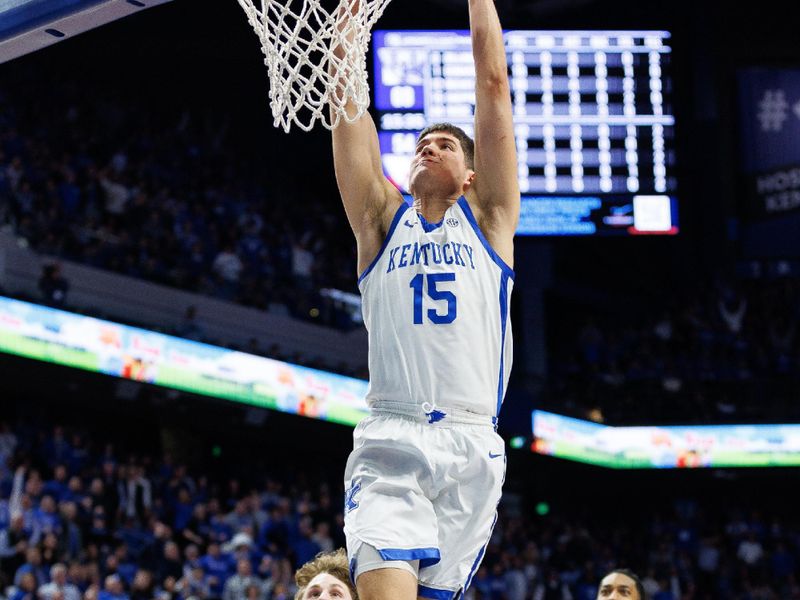 Feb 24, 2024; Lexington, Kentucky, USA; Kentucky Wildcats guard Reed Sheppard (15) dunks the ball during the second half against the Alabama Crimson Tide at Rupp Arena at Central Bank Center. Mandatory Credit: Jordan Prather-USA TODAY Sports