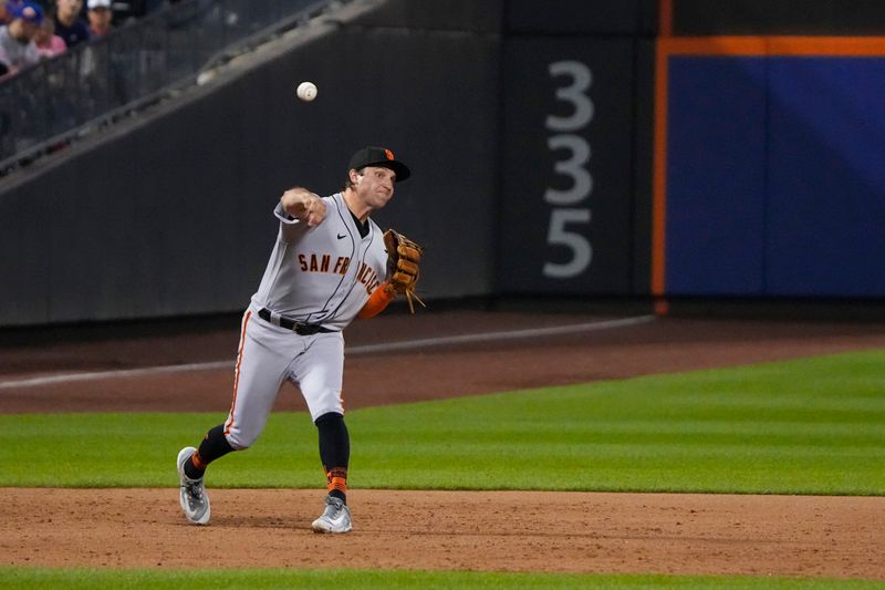 Jul 2, 2023; New York City, New York, USA; San Francisco Giants third baseman Casey Schmitt (6) throws out New York Mets right fielder Starling Marte (not pictured) after fielding a ground ball during the fifth inning at Citi Field. Mandatory Credit: Gregory Fisher-USA TODAY Sports