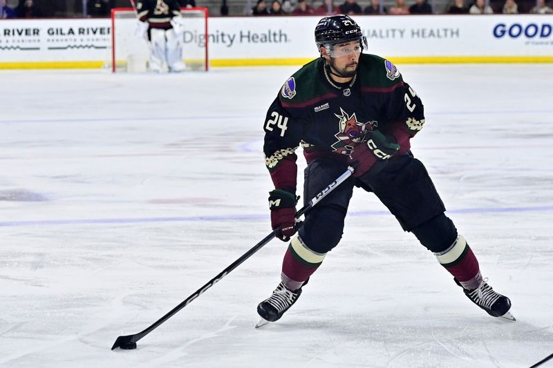 Nov 2, 2023; Tempe, Arizona, USA;  Arizona Coyotes defenseman Matt Dumba (24) shoots the puck in the second period against the Montreal Canadiens at Mullett Arena. Mandatory Credit: Matt Kartozian-USA TODAY Sports