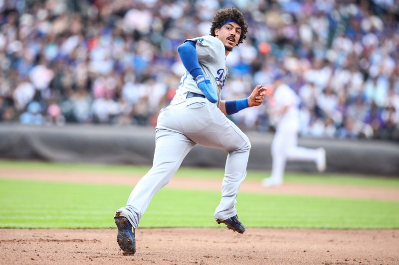 May 29, 2024; New York City, New York, USA;  Los Angeles Dodgers left fielder Miguel Vargas (27) runs to second after the ball gets away on a pick off attempt in the fifth inning against the New York Mets at Citi Field. Mandatory Credit: Wendell Cruz-USA TODAY Sports