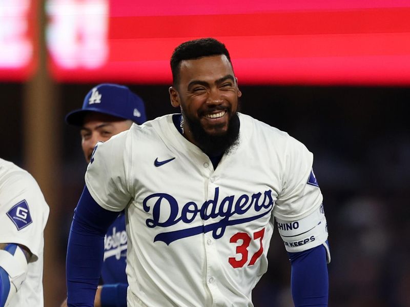 Jul 2, 2024; Los Angeles, California, USA;  Los Angeles Dodgers left fielder Teoscar Hernandez (37) celebrates after hitting a walk off hit to defeat the Arizona Diamondbacks in bottom of the ninth inning at Dodger Stadium. Mandatory Credit: Kiyoshi Mio-USA TODAY Sports