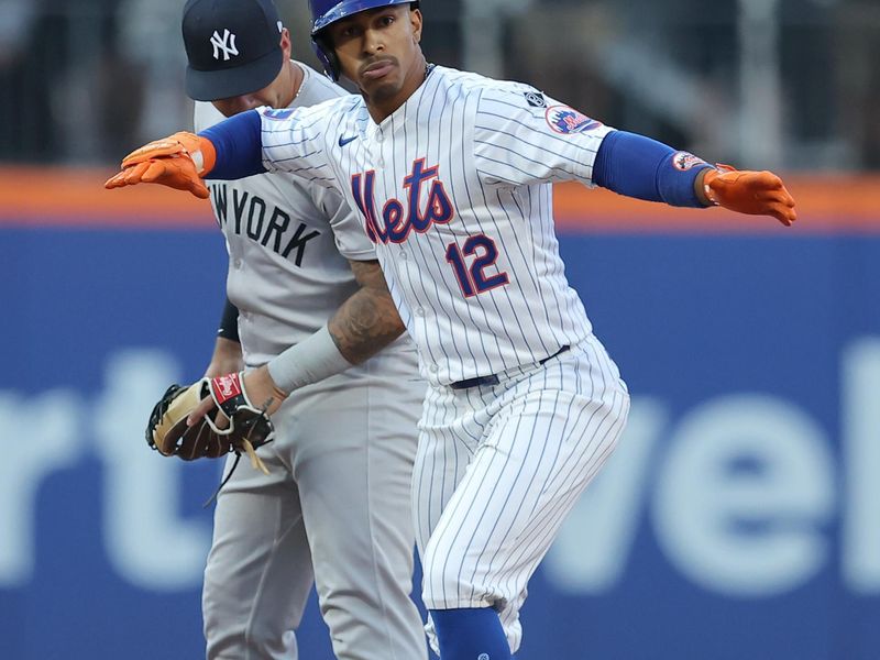 Jun 25, 2024; New York City, New York, USA; New York Mets shortstop Francisco Lindor (12) reacts after hitting a double against the New York Yankees during the first inning at Citi Field. Mandatory Credit: Brad Penner-USA TODAY Sports