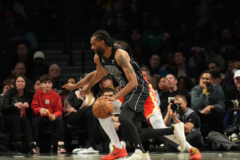 BROOKLYN, NY - FEBRUARY 29: Keita Bates-Diop #13 of the Brooklyn Nets dribbles the ball during the game against the Atlanta Hawks on February 29, 2024 at Barclays Center in Brooklyn, New York. NOTE TO USER: User expressly acknowledges and agrees that, by downloading and or using this Photograph, user is consenting to the terms and conditions of the Getty Images License Agreement. Mandatory Copyright Notice: Copyright 2024 NBAE (Photo by Jesse D. Garrabrant/NBAE via Getty Images)