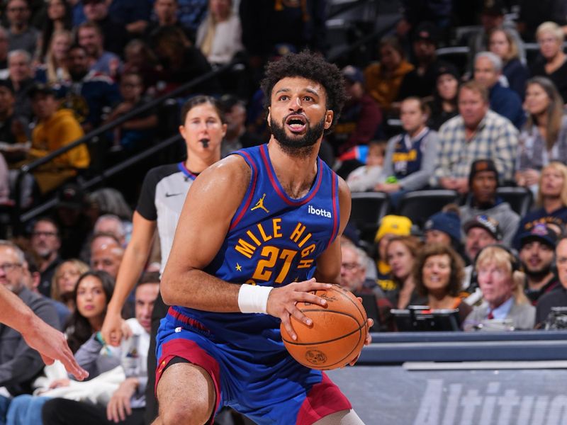 DENVER, CO - NOVEMBER 8: Jamal Murray #27 of the Denver Nuggets handles the ball during the game Miami Heat on November 8, 2024 at Ball Arena in Denver, Colorado. NOTE TO USER: User expressly acknowledges and agrees that, by downloading and/or using this Photograph, user is consenting to the terms and conditions of the Getty Images License Agreement. Mandatory Copyright Notice: Copyright 2024 NBAE (Photo by Bart Young/NBAE via Getty Images)