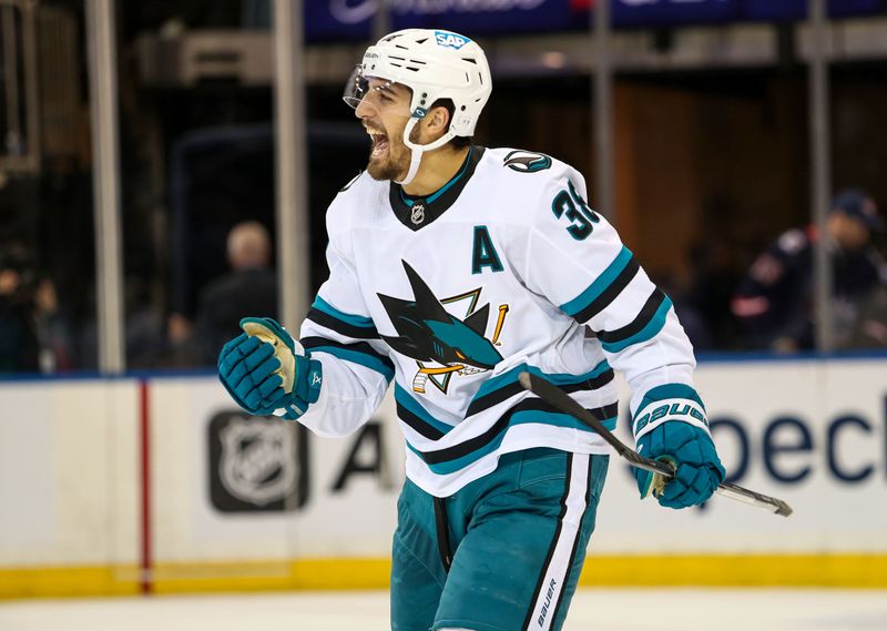 Oct 20, 2022; New York, New York, USA; San Jose Sharks defenseman Mario Ferraro (38) celebrates after a 3-2 overtime win against the New York Rangers at Madison Square Garden. Mandatory Credit: Danny Wild-USA TODAY Sports