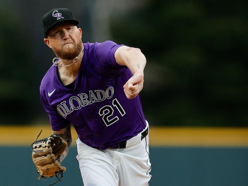 Apr 8, 2025; Denver, Colorado, USA; Colorado Rockies starting pitcher Kyle Freeland (21) pitches in the first inning against the Milwaukee Brewers at Coors Field. Mandatory Credit: Isaiah J. Downing-Imagn Images