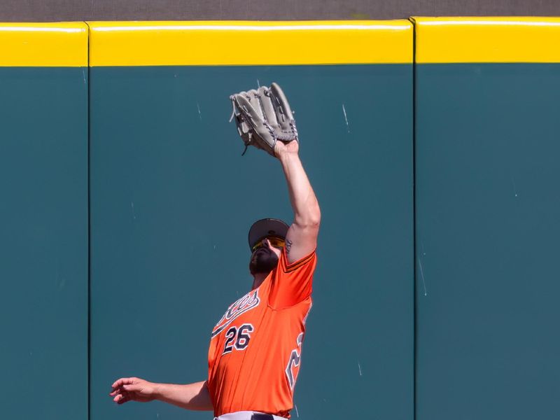 Feb 26, 2023; Lakeland, Florida, USA; Baltimore Orioles left fielder Ryan McKenna (26) catches a fly ball during the second inning against the Detroit Tigers at Publix Field at Joker Marchant Stadium. Mandatory Credit: Mike Watters-USA TODAY Sports