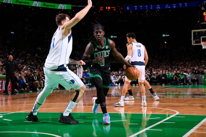 BOSTON, MA - MARCH 1: Jrue Holiday #4 of the Boston Celtics dribbles the ball during the game against the Dallas Mavericks on March 1, 2024 at the TD Garden in Boston, Massachusetts. NOTE TO USER: User expressly acknowledges and agrees that, by downloading and or using this photograph, User is consenting to the terms and conditions of the Getty Images License Agreement. Mandatory Copyright Notice: Copyright 2024 NBAE  (Photo by Brian Babineau/NBAE via Getty Images)