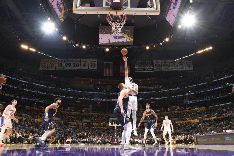 LOS ANGELES, CA - NOVEMBER 23: Anthony Davis #3 of the Los Angeles Lakers shoots the ball during the game against the Denver Nuggets on November 23, 2024 at Crypto.Com Arena in Los Angeles, California. NOTE TO USER: User expressly acknowledges and agrees that, by downloading and/or using this Photograph, user is consenting to the terms and conditions of the Getty Images License Agreement. Mandatory Copyright Notice: Copyright 2024 NBAE (Photo by Adam Pantozzi/NBAE via Getty Images)