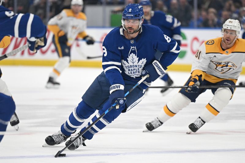 Oct 14, 2025; Toronto, Ontario, CAN;  Toronto Maple Leafs defenseman Chris Tanev (8) skates with the puck against the Nashville Predators in the second period at Scotiabank Arena. Mandatory Credit: Dan Hamilton-Imagn Images