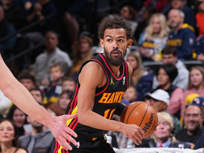 DENVER, CO - JANUARY 1: Trae Young #11 of the Atlanta Hawks dribbles the ball during the game against the Denver Nuggets on January 1, 2025 at Ball Arena in Denver, Colorado. NOTE TO USER: User expressly acknowledges and agrees that, by downloading and/or using this Photograph, user is consenting to the terms and conditions of the Getty Images License Agreement. Mandatory Copyright Notice: Copyright 2025 NBAE (Photo by Bart Young/NBAE via Getty Images)