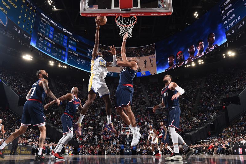 INGLEWOOD, CA - NOVEMBER 18: Jonathan Kuminga #00 of the Golden State Warriors drives to the basket during the game against the LA Clippers on November 18, 2024 at Intuit Dome in Los Angeles, California. NOTE TO USER: User expressly acknowledges and agrees that, by downloading and/or using this Photograph, user is consenting to the terms and conditions of the Getty Images License Agreement. Mandatory Copyright Notice: Copyright 2024 NBAE (Photo by Juan Ocampo/NBAE via Getty Images)