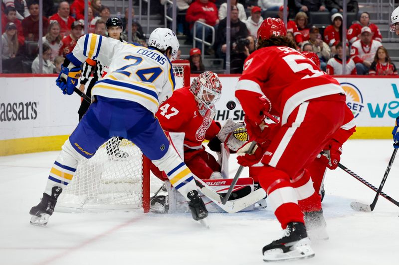 Mar 16, 2024; Detroit, Michigan, USA;  Detroit Red Wings goaltender James Reimer (47) makes a save on Buffalo Sabres center Dylan Cozens (24) in the second period at Little Caesars Arena. Mandatory Credit: Rick Osentoski-USA TODAY Sports