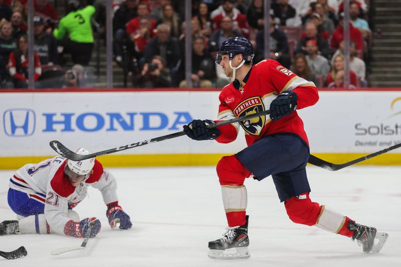 Feb 29, 2024; Sunrise, Florida, USA; Florida Panthers center Sam Reinhart (13) scores against the Montreal Canadiens during the second period at Amerant Bank Arena. Mandatory Credit: Sam Navarro-USA TODAY Sports