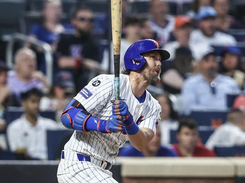 Jul 29, 2024; New York City, New York, USA;  New York Mets second baseman Jeff McNeil (1) hits an RBI single in the fourth inning against the Minnesota Twins at Citi Field. Mandatory Credit: Wendell Cruz-USA TODAY Sports