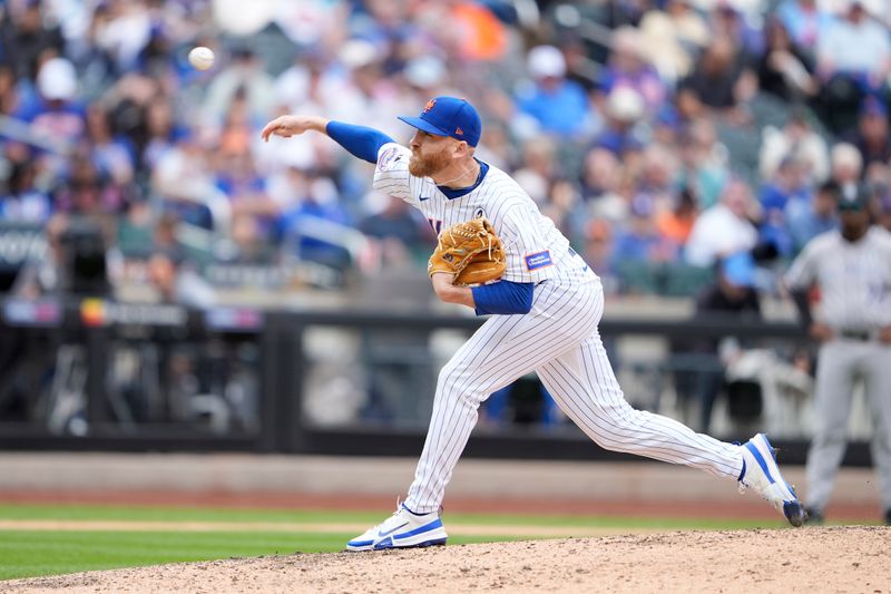 Jun 1, 2025; New York City, New York, USA; New York Mets pitcher Reed Garrett (75) delivers a pitch against the Colorado Rockies during the eighth inning at Citi Field. Mandatory Credit: Gregory Fisher-Imagn Images