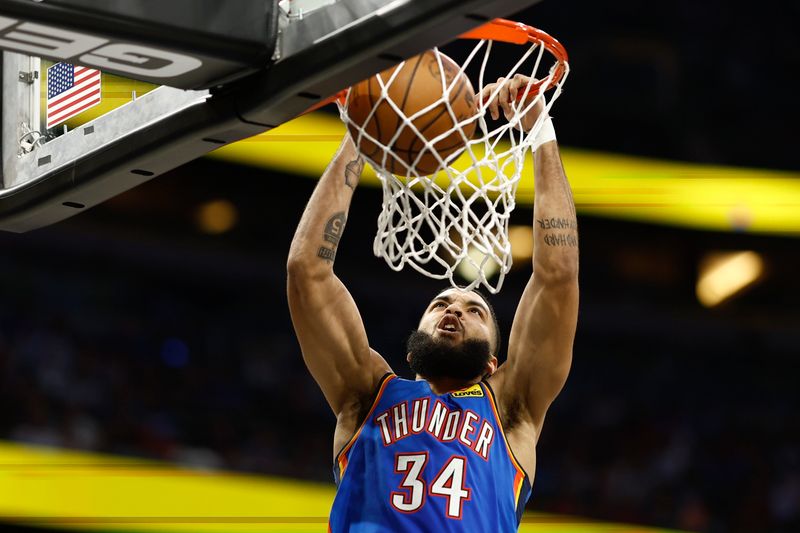 ORLANDO, FLORIDA - JANUARY 04: Kenrich Williams #34 of the Oklahoma City Thunder slams the ball against the Orlando Magic during the second quarter at Amway Center on January 04, 2023 in Orlando, Florida. NOTE TO USER: User expressly acknowledges and agrees that, by downloading and or using this photograph, User is consenting to the terms and conditions of the Getty Images License Agreement. (Photo by Douglas P. DeFelice/Getty Images)