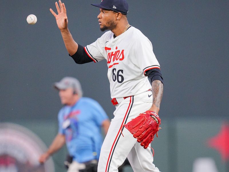 Jun 13, 2024; Minneapolis, Minnesota, USA; Minnesota Twins pitcher Jorge Alcala (66) celebrates after the game against the Oakland Athletics at Target Field. Mandatory Credit: Brad Rempel-USA TODAY Sports