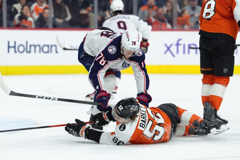 Mar 14, 2026; Philadelphia, Pennsylvania, USA; Columbus Blue Jackets defenseman Damon Severson (78) hits Philadelphia Flyers center Denver Barkley (52) in the second period at Xfinity Mobile Arena. Mandatory Credit: Kyle Ross-Imagn Images