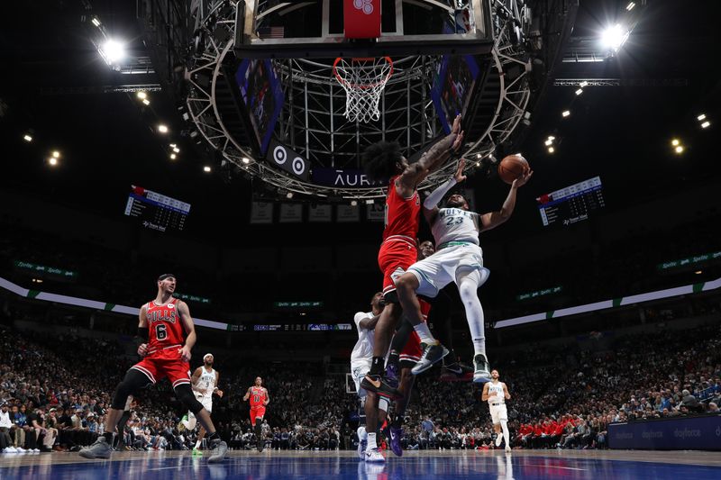 MINNEAPOLIS, MN -  MARCH 31: Monte Morris #23 of the Minnesota Timberwolves handles the ball during the game against the Chicago Bulls on March 31, 2024 at Target Center in Minneapolis, Minnesota. NOTE TO USER: User expressly acknowledges and agrees that, by downloading and or using this Photograph, user is consenting to the terms and conditions of the Getty Images License Agreement. Mandatory Copyright Notice: Copyright 2024 NBAE (Photo by Jordan Johnson/NBAE via Getty Images)