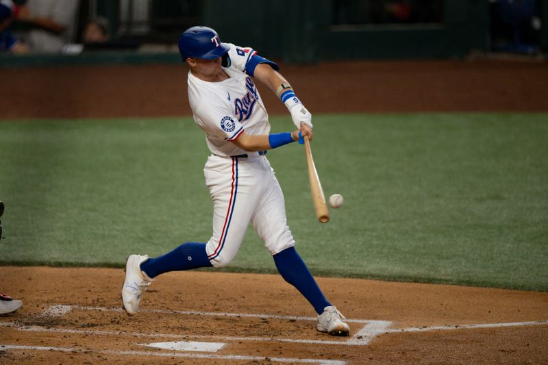 Aug 21, 2024; Arlington, Texas, USA; Texas Rangers third baseman Josh Jung (6) bats against the Pittsburgh Pirates during the second inning at Globe Life Field. Mandatory Credit: Jerome Miron-USA TODAY Sports