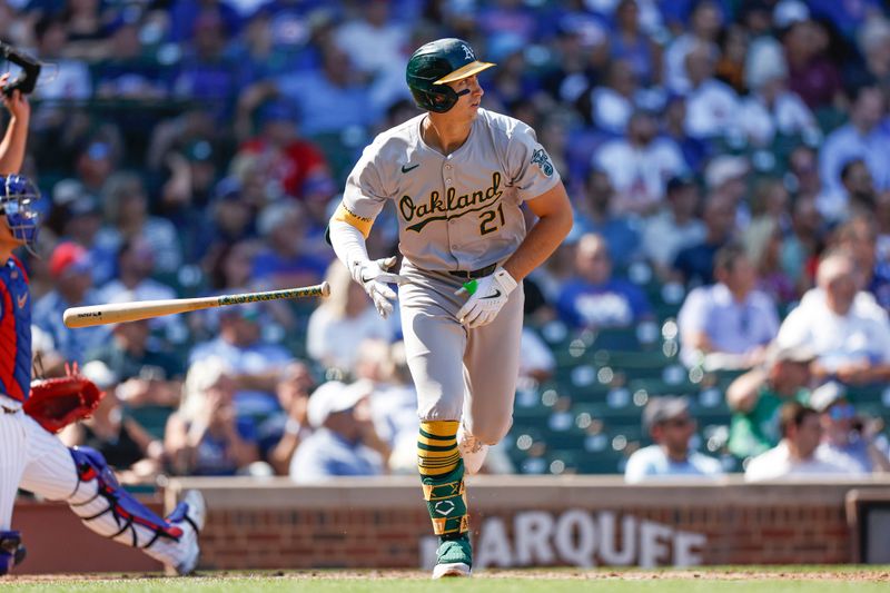 Sep 18, 2024; Chicago, Illinois, USA; Oakland Athletics first baseman Tyler Soderstrom (21) watches his solo home run against the Chicago Cubs during the fourth inning at Wrigley Field. Mandatory Credit: Kamil Krzaczynski-Imagn Images