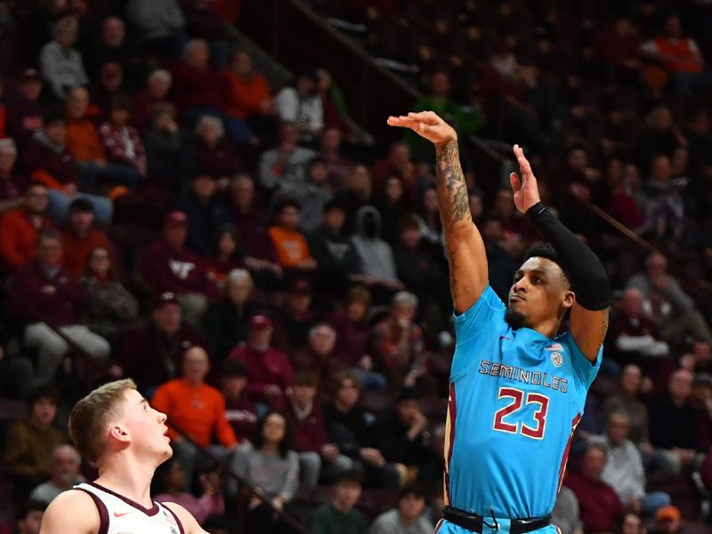 Feb 13, 2024; Blacksburg, Virginia, USA; Florida State Seminoles guard Primo Spears (23) shoots over defender Virginia Tech Hokies guard Sean Pedulla (3) during the first half at Cassell Coliseum. Mandatory Credit: Brian Bishop-USA TODAY Sports