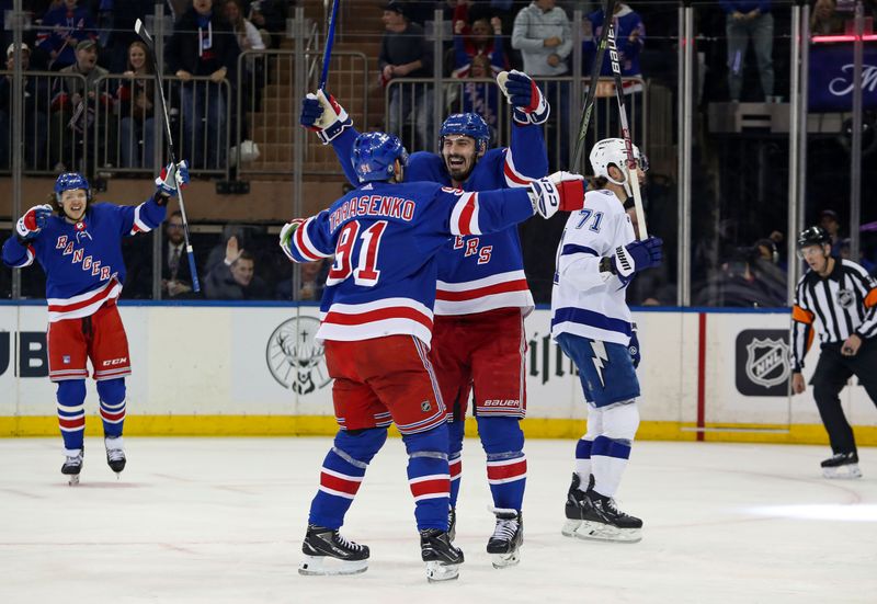 Apr 5, 2023; New York, New York, USA; New York Rangers left wing Chris Kreider (20) celebrates his goal with right wing Vladimir Tarasenko (91) during the first period against the Tampa Bay Lightning at Madison Square Garden. Mandatory Credit: Danny Wild-USA TODAY Sports