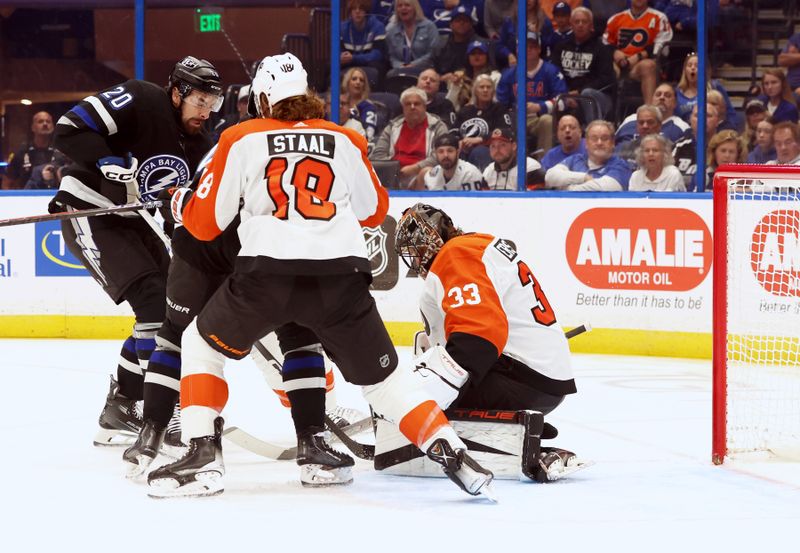 Mar 9, 2024; Tampa, Florida, USA;Tampa Bay Lightning left wing Nicholas Paul (20) shoots and scores a goal against the Philadelphia Flyers during the first period at Amalie Arena. Mandatory Credit: Kim Klement Neitzel-USA TODAY Sports