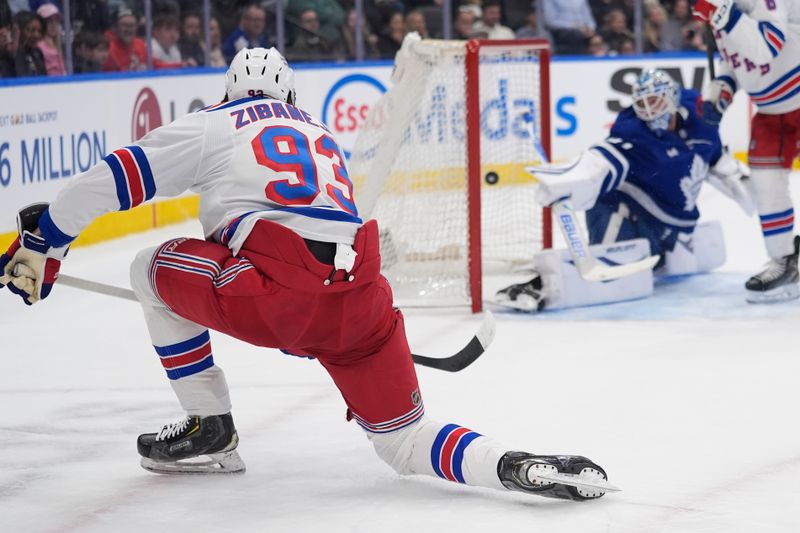 Mar 25, 2026; Toronto, Ontario, CAN; New York Rangers forward Mika Zibanejad (93) scores on Toronto Maple Leafs goaltender Joseph Woll (60) during the second period at Scotiabank Arena. Mandatory Credit: John E. Sokolowski-Imagn Images Mar 25, 2026; Toronto, Ontario, CAN; New York Rangers forward Mika Zibanejad (93) scores on Toronto Maple Leafs goaltender Joseph Woll (60) during the second period at Scotiabank Arena. Mandatory Credit: John E. Sokolowski-Imagn Images