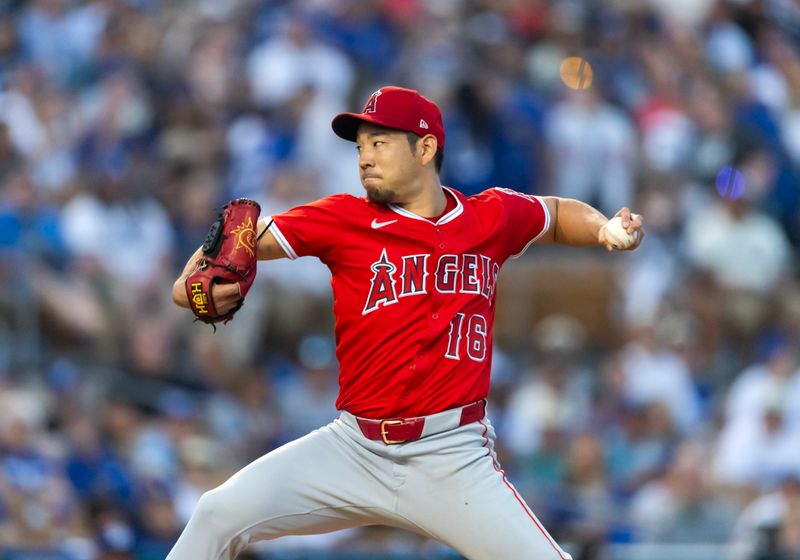 Feb 28, 2025; Phoenix, Arizona, USA; Los Angeles Angels pitcher Yusei Kikuchi (16) against the Los Angeles Dodgers during a spring training game at Camelback Ranch-Glendale. Mandatory Credit: Mark J. Rebilas-Imagn Images