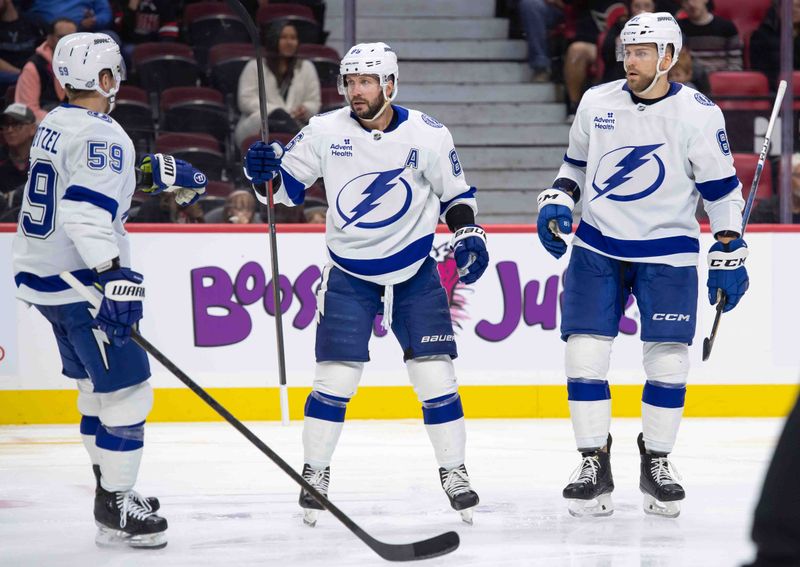 Oct 19, 2024; Ottawa, Ontario, CAN; Tampa Bay Lightning right wing Nikita Kucherov (86) celebrates his goal scored in the second period against the Ottawa Senators at the Canadian Tire Centre. Mandatory Credit: Marc DesRosiers-Imagn Images