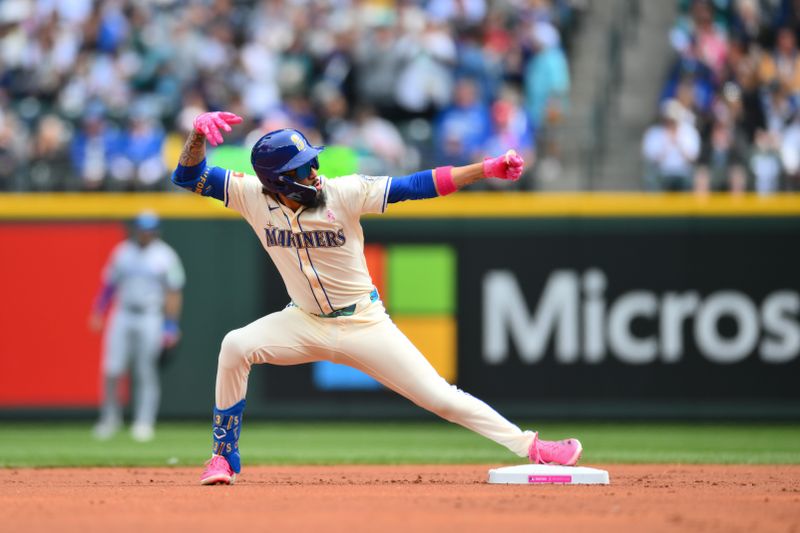 May 11, 2025; Seattle, Washington, USA; Seattle Mariners shortstop J.P. Crawford (3) celebrates after hitting a double against the Toronto Blue Jays during the first inning at T-Mobile Park. Mandatory Credit: Steven Bisig-Imagn Images