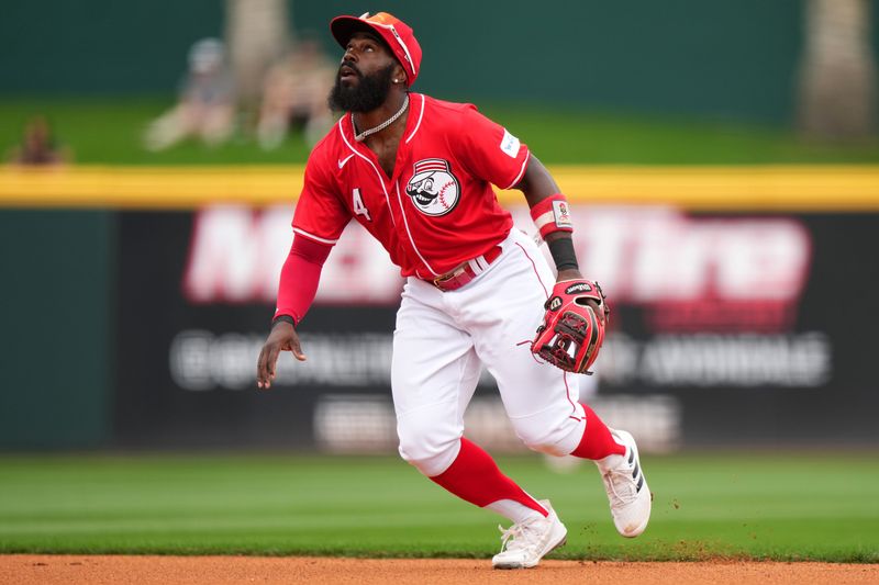 Feb 26, 2024; Goodyear, AZ, USA; Cincinnati Reds second baseman Josh Harrison tracks a pop fly in the first inning during a MLB spring training baseball game against the Seattle Mariners, Monday, Feb. 26, 2024, at Goodyear Ballpark in Goodyear, Ariz. Mandatory Credit: Kareem Elgazzar-USA TODAY Sports