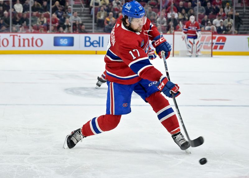 Jan 11, 2024; Montreal, Quebec, CAN; Montreal Canadiens forward Josh Anderson (17) shoots the puck during the third period of the game against the San Jose Sharks at the Bell Centre. Mandatory Credit: Eric Bolte-USA TODAY Sports