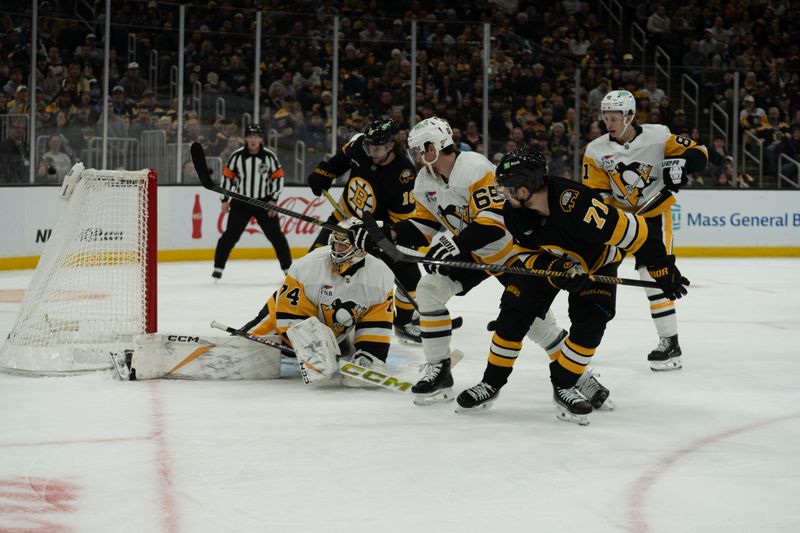 Jan 11, 2026; Boston, Massachusetts, USA; Boston Bruins right-winger Viktor Arvidsson (71) scores during the first period of the game against the Pittsburgh Penguins at TD Garden. Mandatory Credit: Natalie Reid-Imagn Images