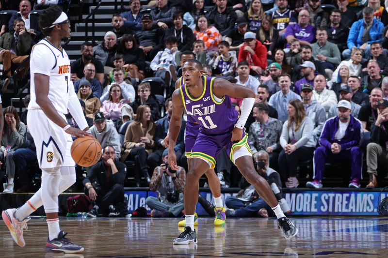 SALT LAKE CITY, UT - JANUARY 10: Kris Dunn #11 of the Utah Jazz plays defense during the game against the Denver Nuggets on January 10, 2024 at Delta Center in Salt Lake City, Utah. NOTE TO USER: User expressly acknowledges and agrees that, by downloading and or using this Photograph, User is consenting to the terms and conditions of the Getty Images License Agreement. Mandatory Copyright Notice: Copyright 2024 NBAE (Photo by Melissa Majchrzak/NBAE via Getty Images)