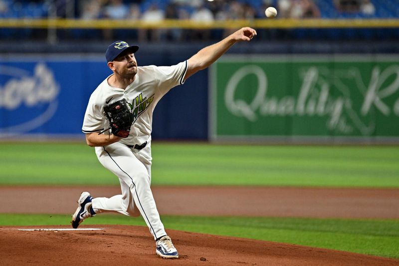 Sep 20, 2024; St. Petersburg, Florida, USA; Tampa Bay Rays starting pitcher Tyler Alexander (14) throws a pitch in the first inning against the Toronto Blue Jays at Tropicana Field. Mandatory Credit: Jonathan Dyer-Imagn Images